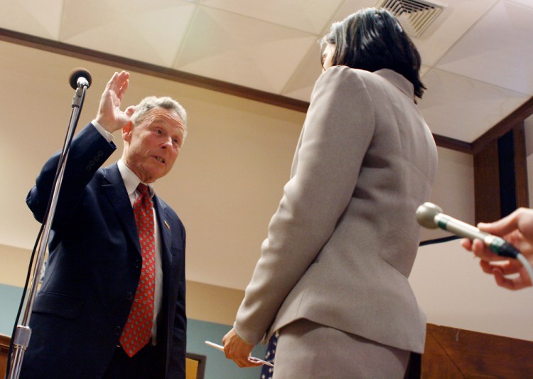 Columbia City Clerk Sheela Amin swears re-elected mayor Darwin Hindman into office on April 9, 2007. Winning more than 70 percent of the vote, Hindman won a record fifth term.