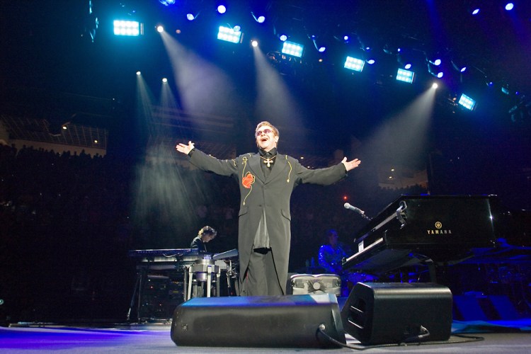 Elton John acknowledges the audience's screams and applause after making his entrance on Oct. 5, 2007, in Mizzou Arena. During an encore, John wore a headband with tiger ears, which a Missouri fan gave him in anticipation of the Tigers' football game against Nebraska on Oct. 6.