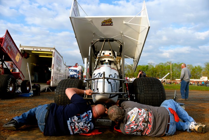 (Left to right) Crew members Vince Hamberger and David Rohrbaugh change out the rear gears of York driver Cory Haas' car before the World of Outlaws and the Pennsylvania Posse raced at Williams Grove Speedway on Friday, May 16, 2014. The World of Outlaws raced their first night of the season at Williams Grove against the Pennsylvania Posse on Friday, May 16, 2014. Chris Dunn — Daily Record/Sunday News
